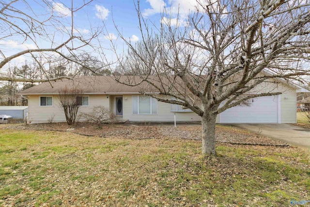 ranch-style house with a garage and a front yard