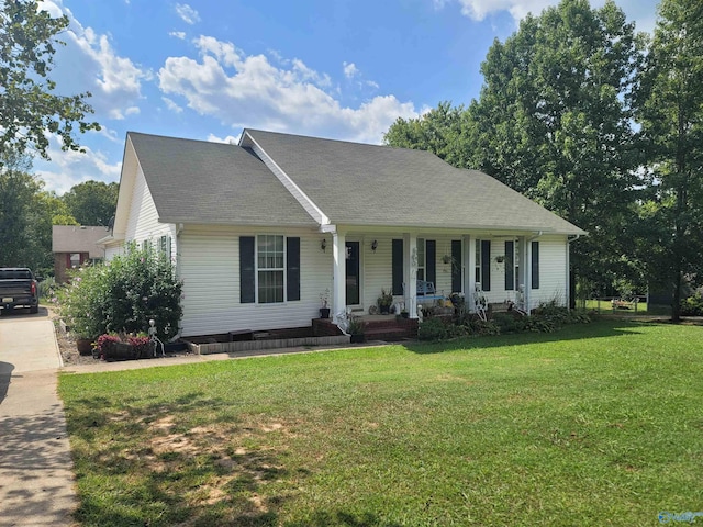 view of front of house featuring covered porch and a front lawn