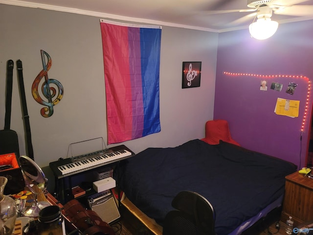 bedroom featuring ornamental molding and ceiling fan