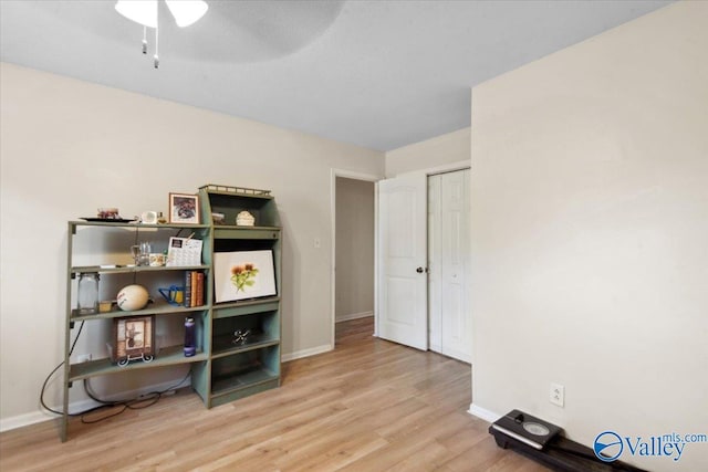 6304 Cedar Point Dr, Huntsville, AL 35810 - bedroom with wood finished floors, baseboards, and a closet