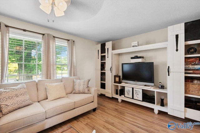 6304 Cedar Point Dr, Huntsville, AL 35810 - living room with wood finished floors and a ceiling fan
