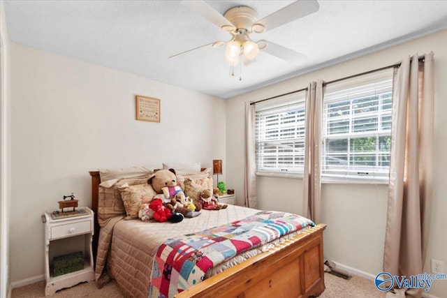 6304 Cedar Point Dr, Huntsville, AL 35810 - bedroom with light colored carpet, baseboards, and ceiling fan