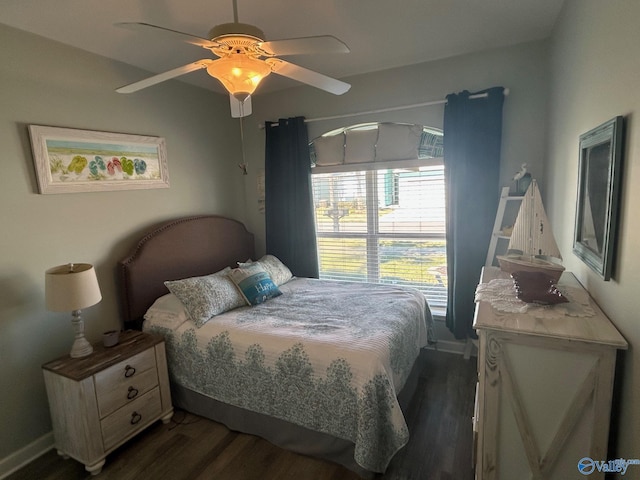 bedroom with dark wood-style flooring and ceiling fan