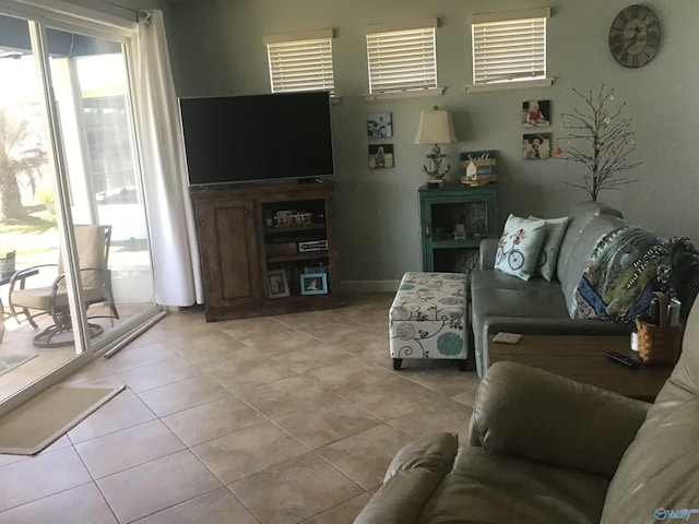 living room with light tile patterned floors