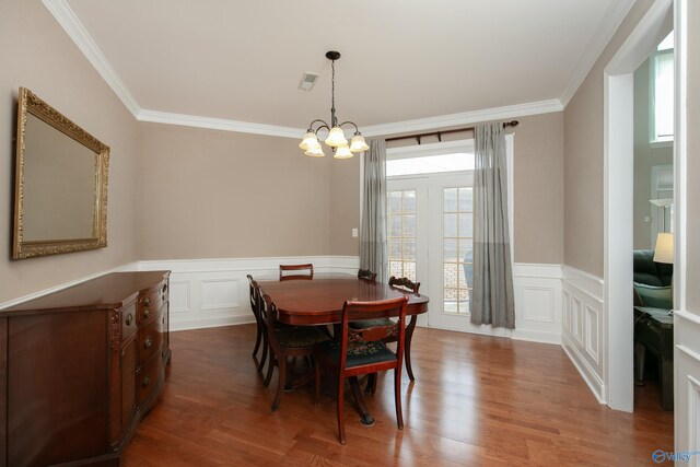 unfurnished living room with built in shelves and ornamental molding