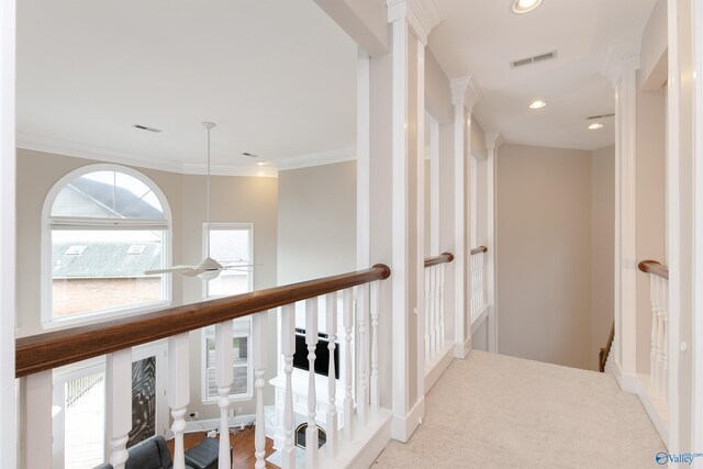 bedroom featuring a nursery area, carpet flooring, and ceiling fan