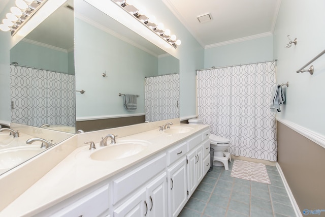 bathroom with toilet, curtained shower, vanity, and crown molding