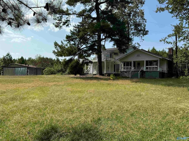 view of yard with a porch