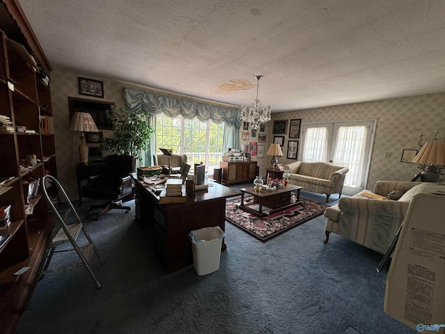 carpeted living room featuring an inviting chandelier, a textured ceiling, and a healthy amount of sunlight