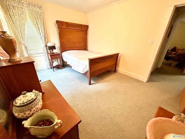 bedroom with light carpet