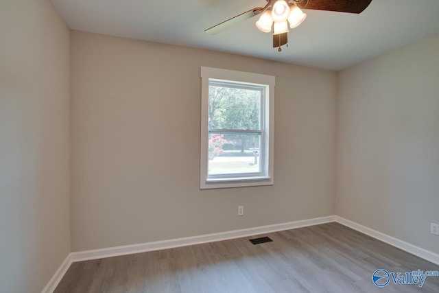 unfurnished room with light hardwood / wood-style floors and ceiling fan