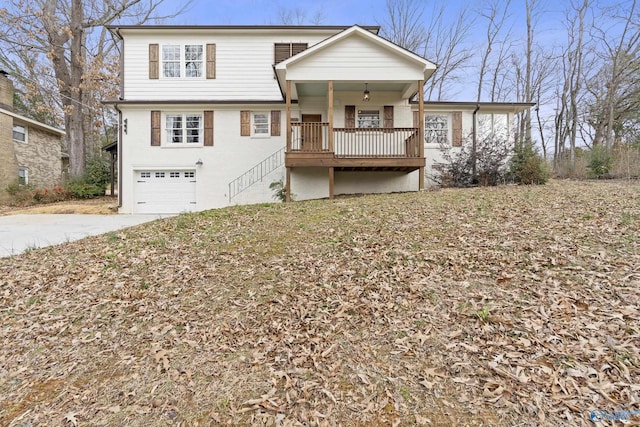 view of front of home with a garage and covered porch