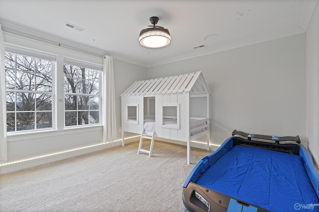 unfurnished bedroom with crown molding and carpet floors