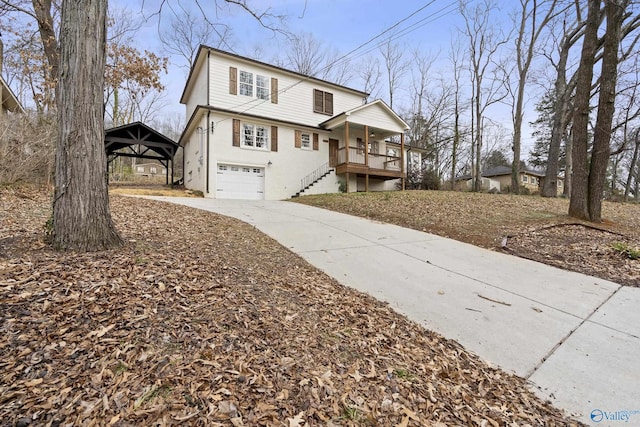 view of front of property with a garage and covered porch