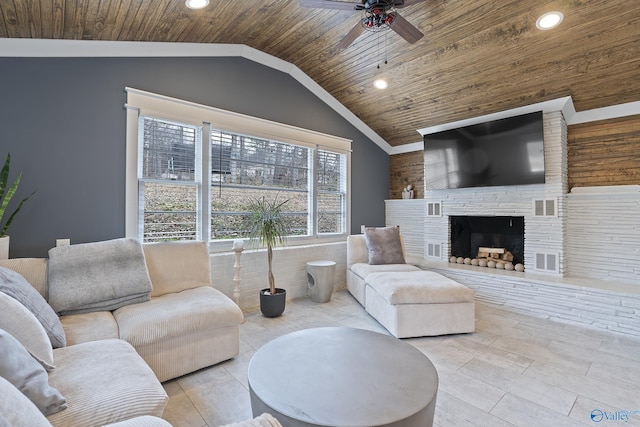 living room featuring wood ceiling, exterior fireplace, and vaulted ceiling