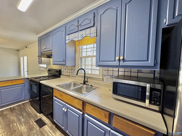 kitchen with ornamental molding, sink, blue cabinetry, and black appliances