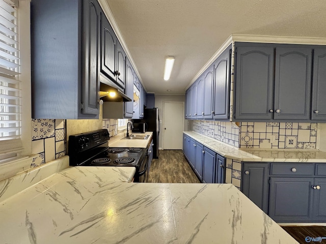 kitchen featuring sink, backsplash, dark hardwood / wood-style flooring, a textured ceiling, and black / electric stove