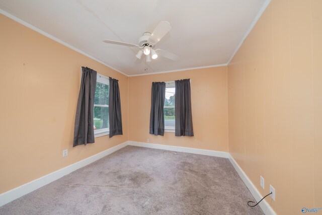 2116 Virginia Blvd NW, Huntsville, AL 35811 - carpeted empty room featuring ornamental molding and a ceiling fan