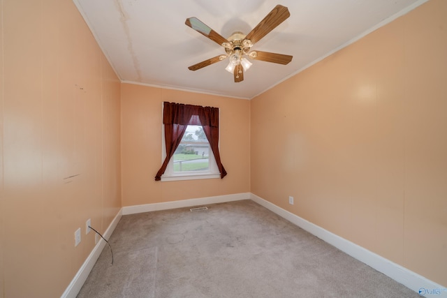 2116 Virginia Blvd NW, Huntsville, AL 35811 - carpeted spare room featuring ceiling fan and crown molding