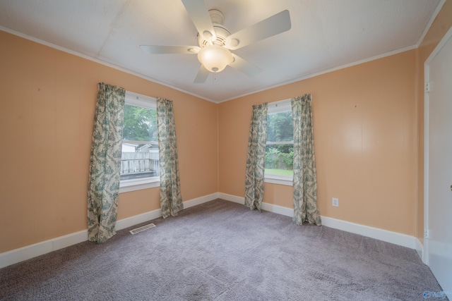 2116 Virginia Blvd NW, Huntsville, AL 35811 - carpeted spare room featuring ornamental molding and a ceiling fan