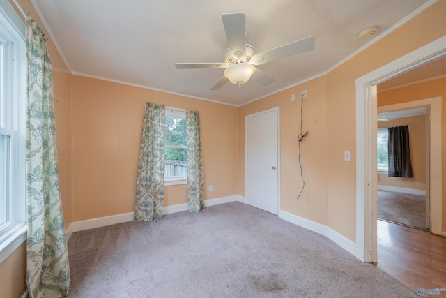 2116 Virginia Blvd NW, Huntsville, AL 35811 - carpeted empty room featuring a smoke detector, a ceiling fan, and ornamental molding