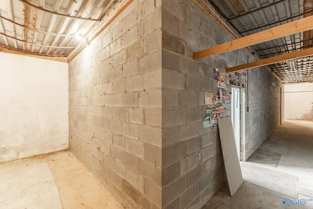 basement with concrete block wall