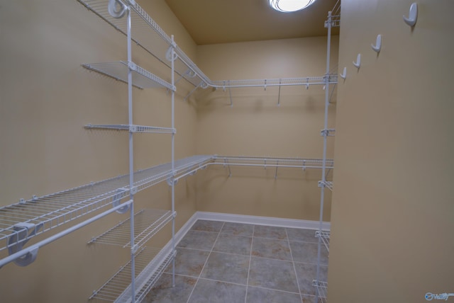 walk in closet featuring tile patterned floors