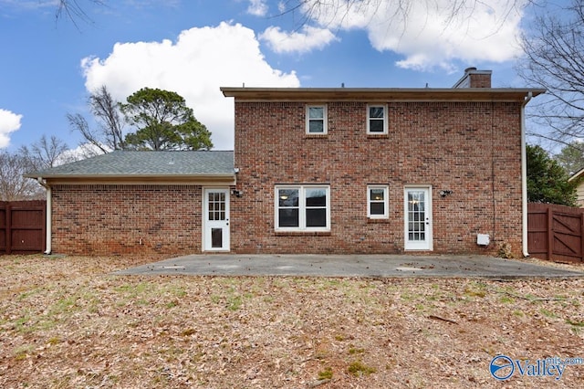 rear view of property with a patio