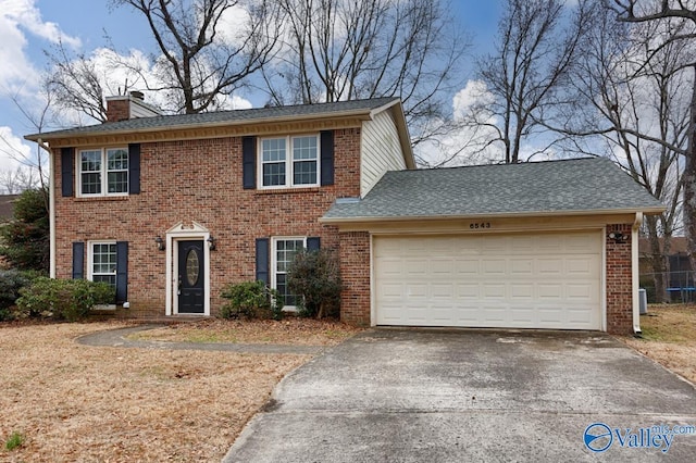 colonial home featuring a garage