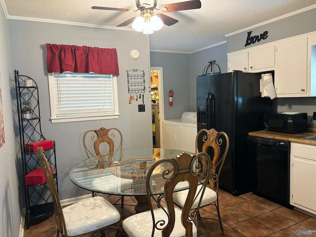 kitchen featuring crown molding, a ceiling fan, washing machine and dryer, white cabinetry, and black appliances