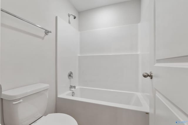 bathroom with toilet and shower / bathtub combination