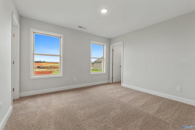 view of carpeted spare room