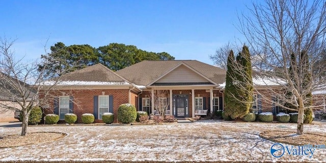 view of front of house with brick siding