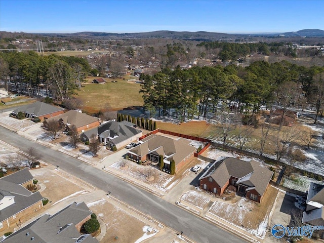 birds eye view of property with a mountain view and a residential view