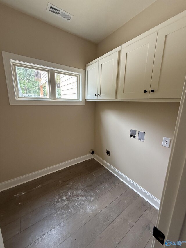 1112 Mountainview Rd NE, Hartselle, AL 35640 - laundry room featuring cabinet space, dark wood-style flooring, baseboards, and hookup for a washing machine