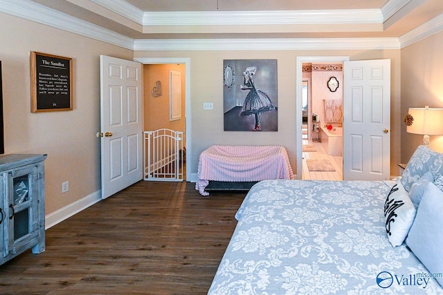 bedroom featuring baseboards, connected bathroom, ornamental molding, and dark wood-type flooring