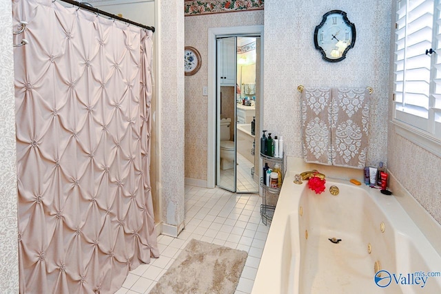 full bathroom with wallpapered walls, a shower with shower curtain, toilet, a jetted tub, and tile patterned flooring