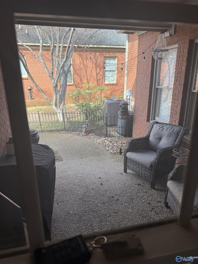 view of patio featuring fence