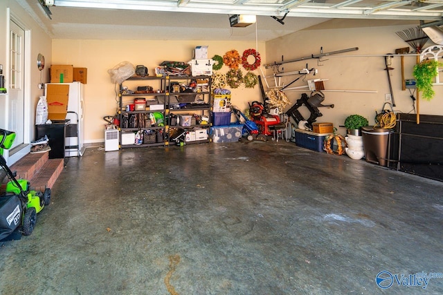 garage featuring a garage door opener