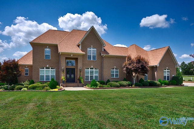 view of front of home with a front yard