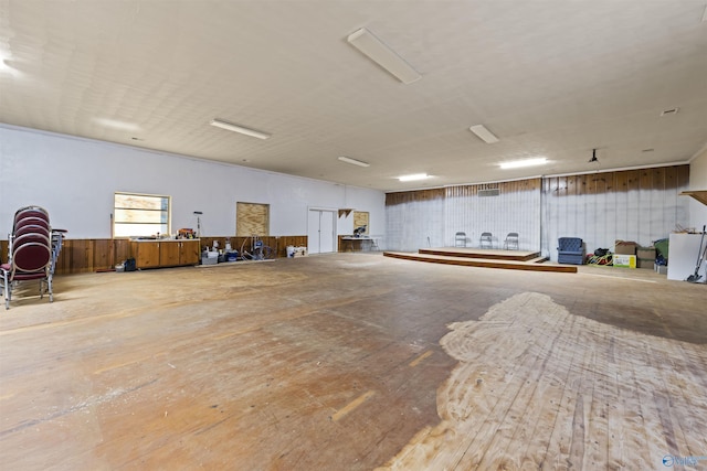 misc room with wood walls and hardwood / wood-style flooring