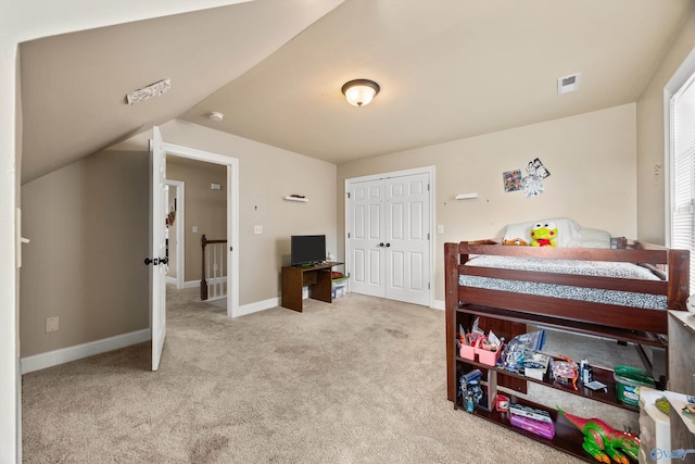 8 Cypress Point Dr, Huntsville, AL 35824 - carpeted bedroom featuring baseboards, a closet, and vaulted ceiling