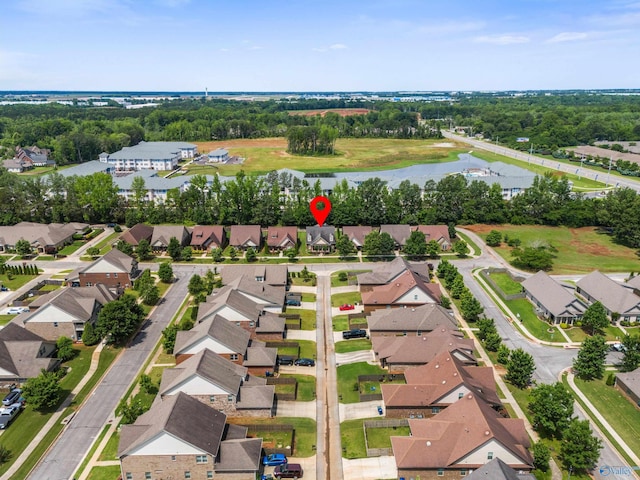 8 Cypress Point Dr, Huntsville, AL 35824 - aerial overview of property's location featuring nearby suburban area, a nearby body of water, and a tree filled landscape