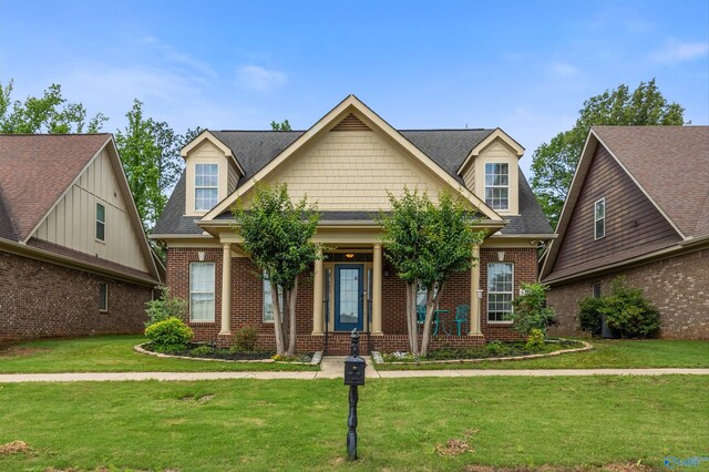 8 Cypress Point Dr, Huntsville, AL 35824 - view of front of house with brick siding and a front lawn