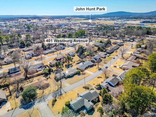 birds eye view of property with a residential view and a mountain view