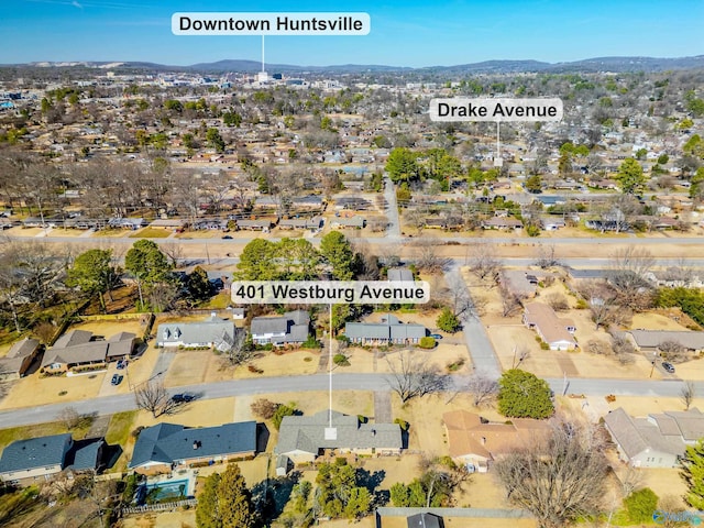 drone / aerial view with a residential view and a mountain view