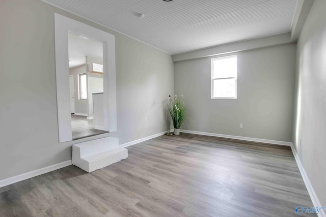 unfurnished room featuring light hardwood / wood-style flooring