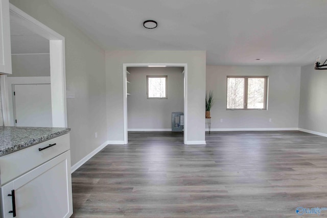 unfurnished living room featuring light wood-type flooring