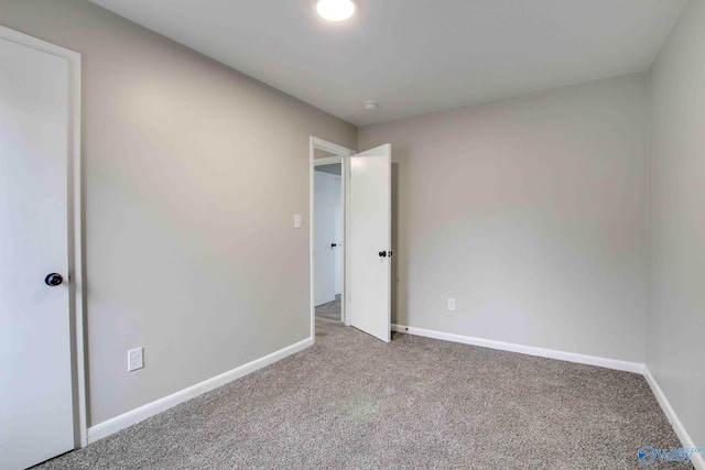 unfurnished bedroom featuring carpet flooring