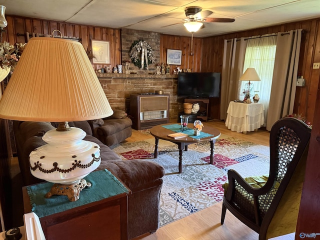 4094 County Road 66, Section, AL 35771 - living area featuring a ceiling fan, wood finished floors, and wood walls